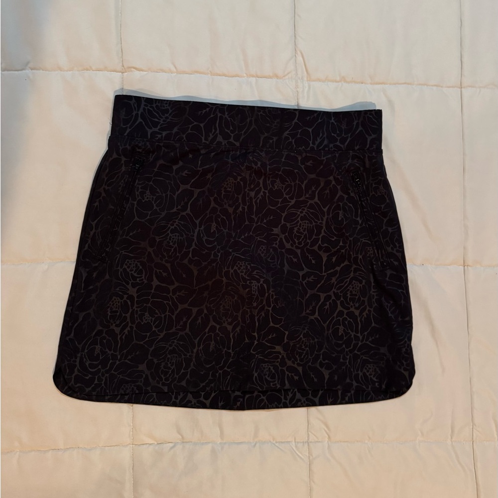 Orvis Dark Mini Skirt with Subtle Floral Design